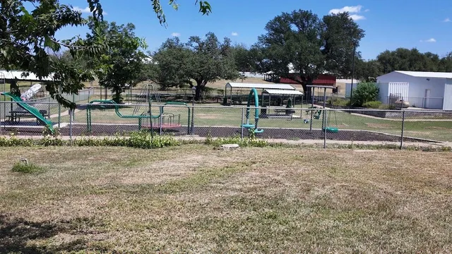 a view of backyard with green space