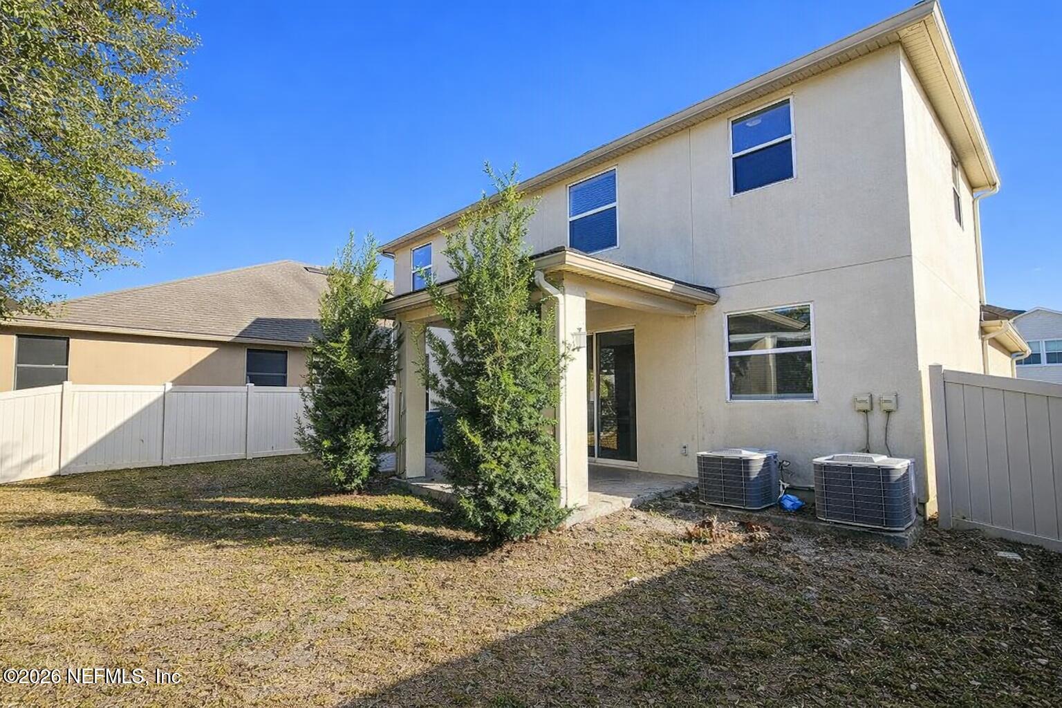 217 Amber Ridge Road Jacksonville, FL 32218 - Photo 34 of 42 a view of a house with backyard and sitting area