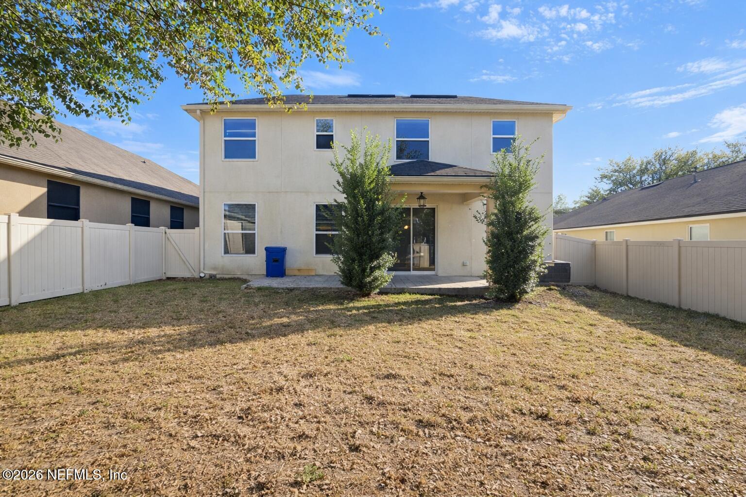 217 Amber Ridge Road Jacksonville, FL 32218 - Photo 39 of 42 a view of a house with a backyard