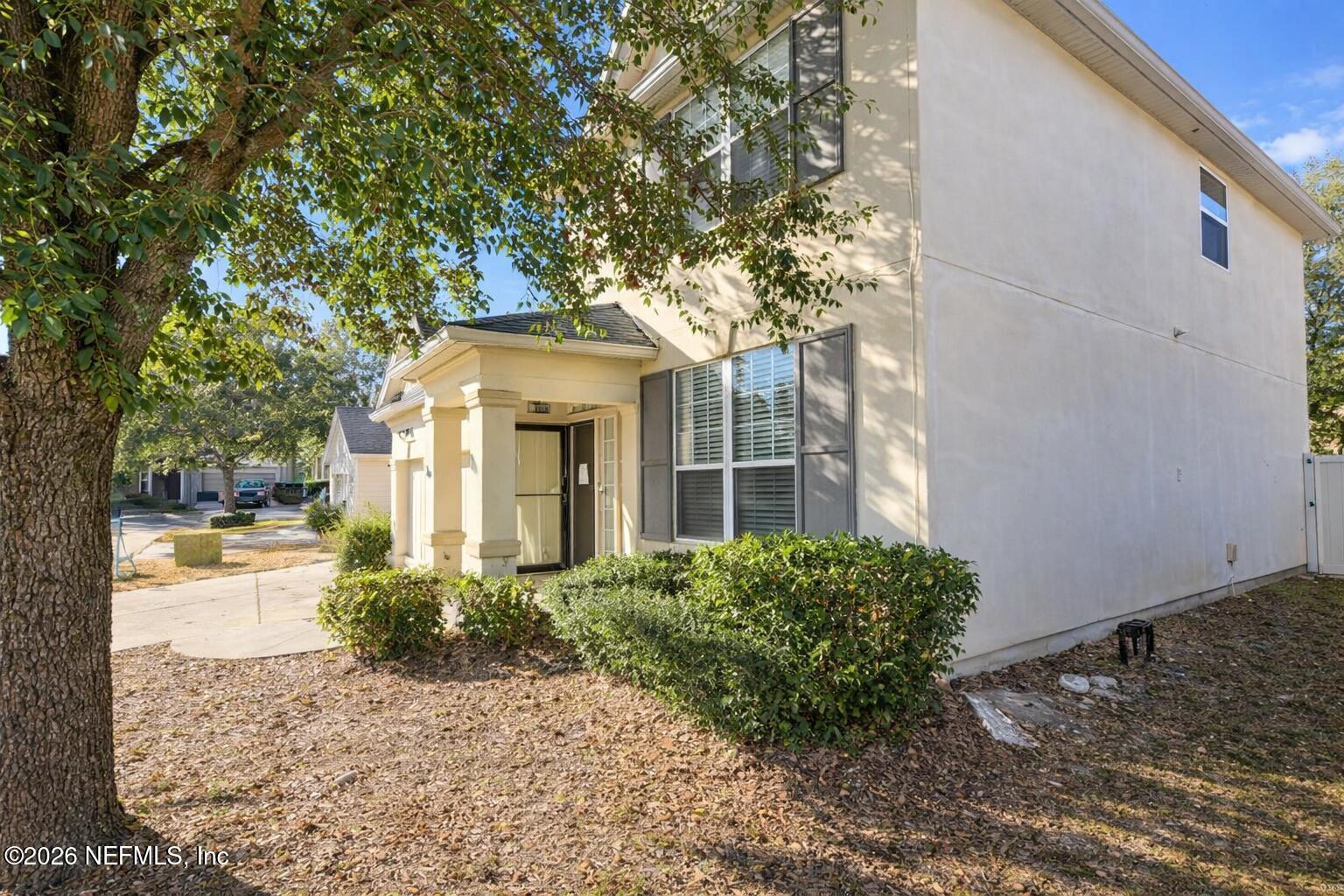 217 Amber Ridge Road Jacksonville, FL 32218 - Photo 40 of 42 a front view of a house with a yard