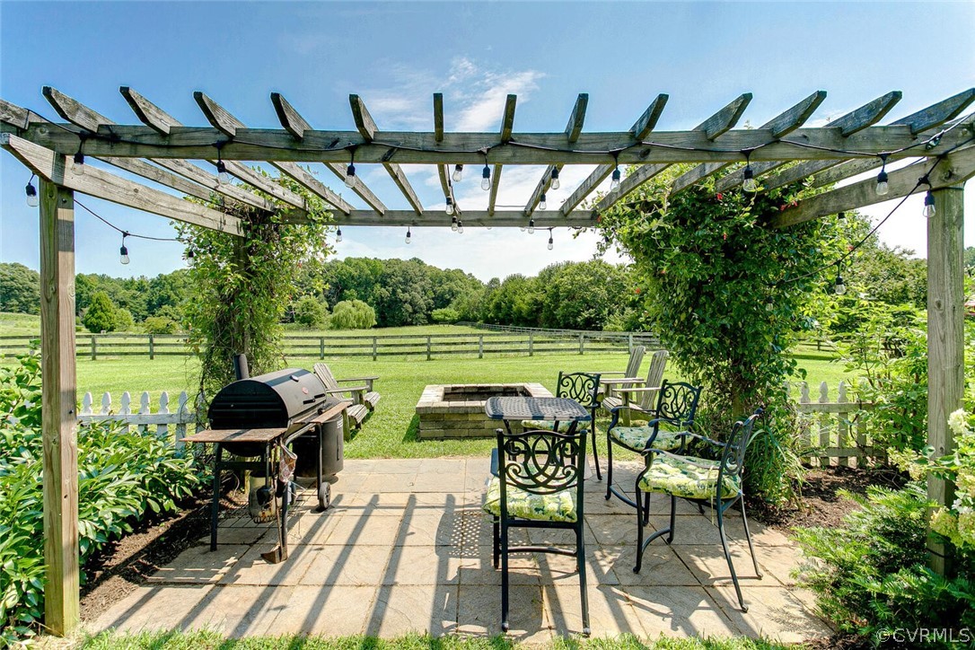 1161 Manakin Road Manakin-Sabot, VA 23103 - Photo 46 of 50 Lit pergola for grilling and outdoor dining. Behin