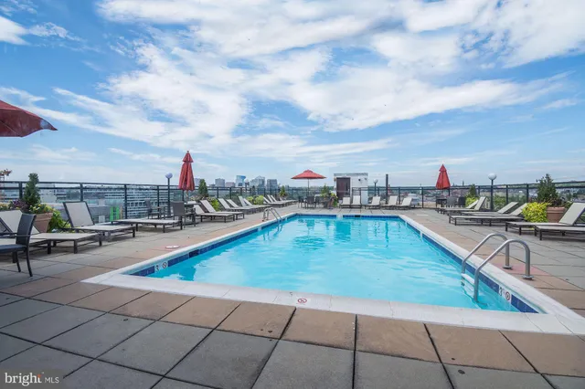 a workspace with furniture and wooden floor