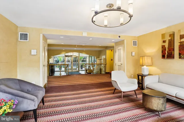a view of a livingroom with furniture and window