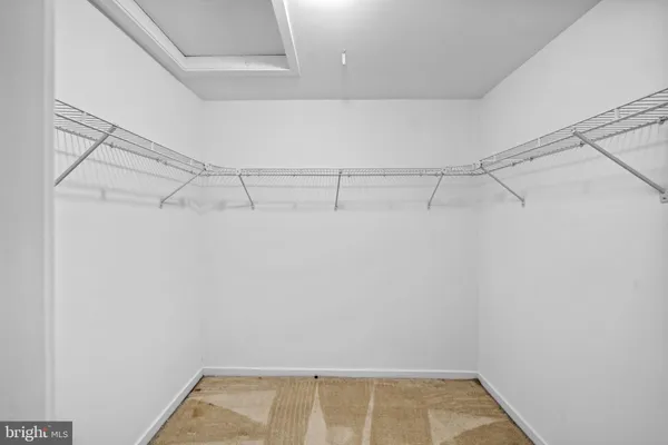 a view of a room with racks on the wall