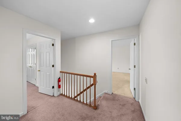 a view of a room with a hallway