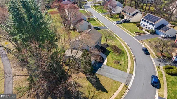 an aerial view of a house with swimming pool