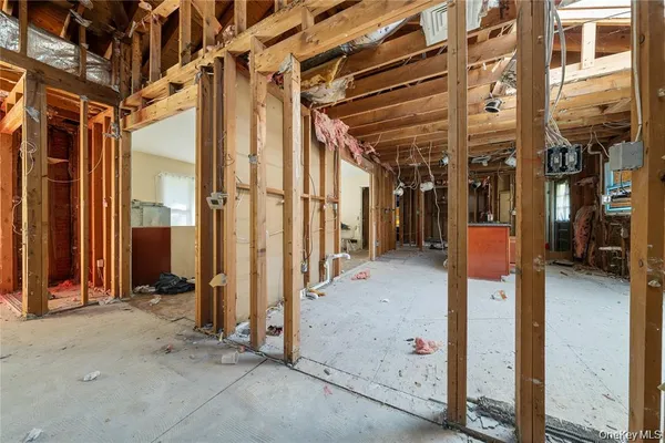 a view of a hallway with wooden building