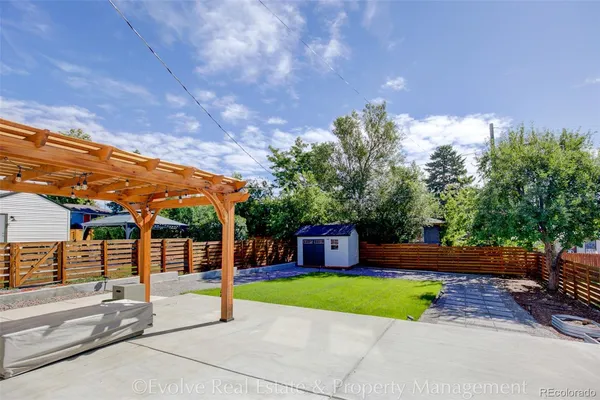 a view of a back yard of the house