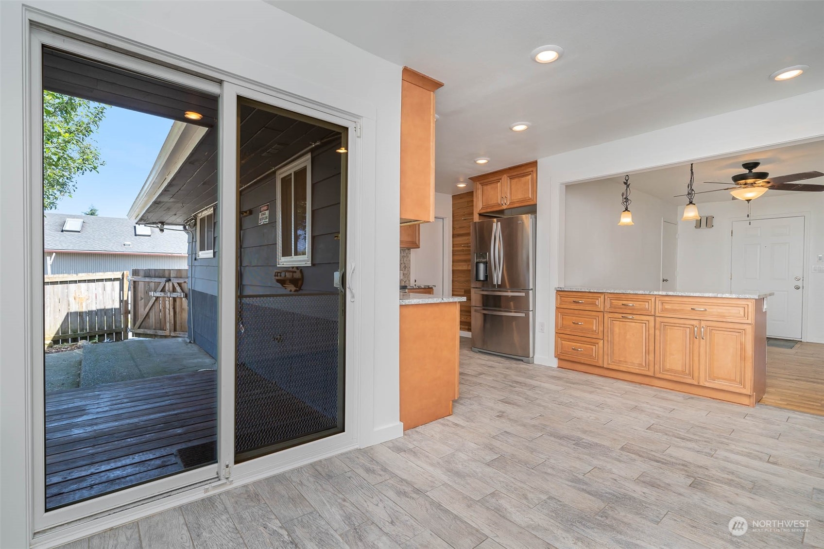 1709 Edmonds Avenue Northeast Renton, WA 98056 - Photo 6 of 31 a view of a kitchen cabinets and wooden floor