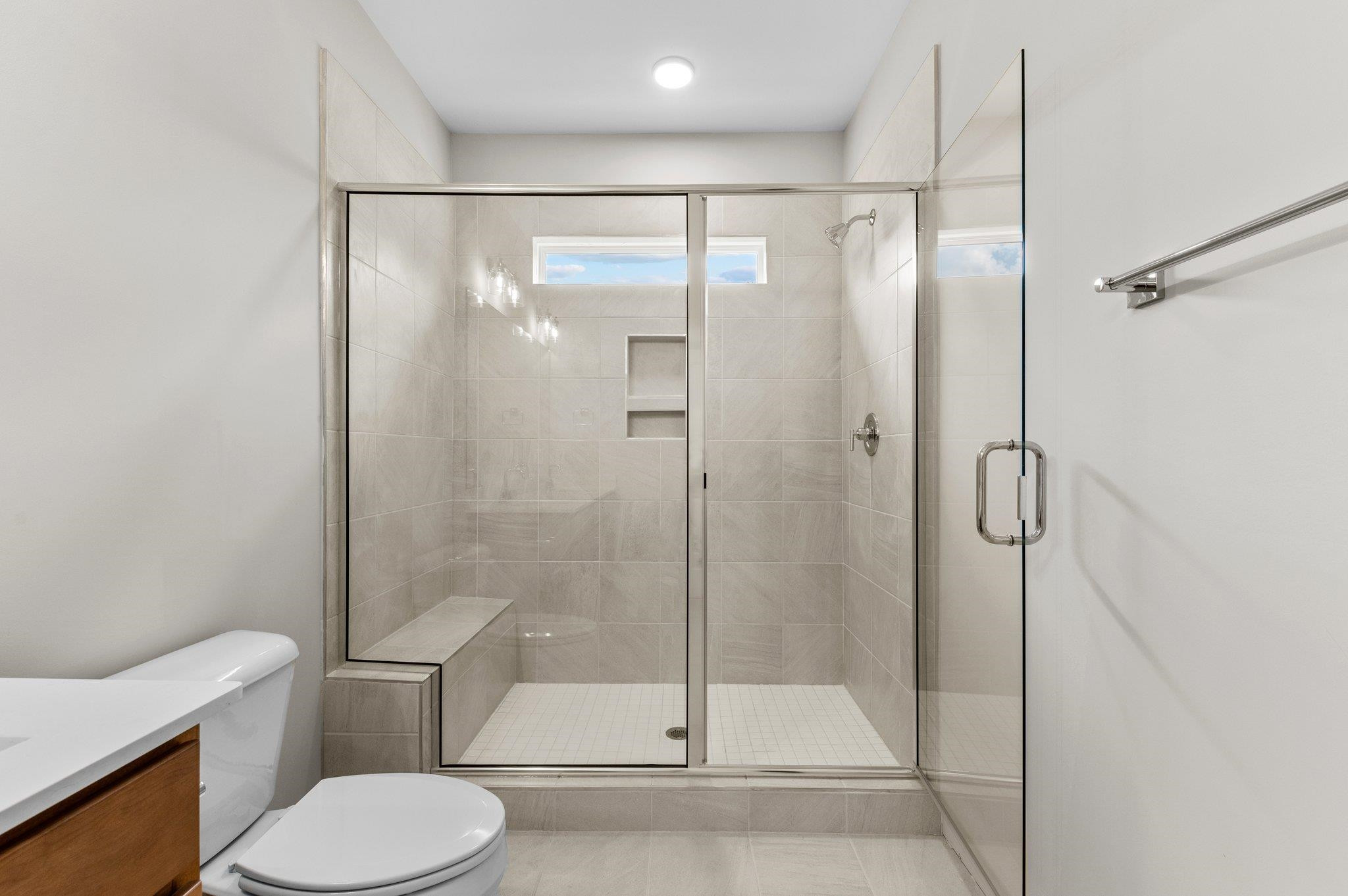 609 Marshskip Way, Unit 5 Rolesville, NC 27571 - Photo 13 of 39 a bathroom with a toilet and a shower