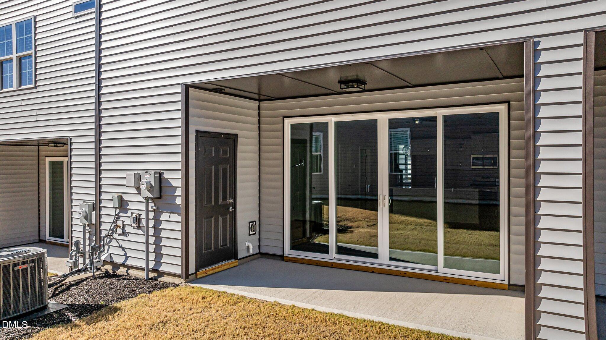 609 Marshskip Way, Unit 5 Rolesville, NC 27571 - Photo 23 of 39 a view of a house with a large window