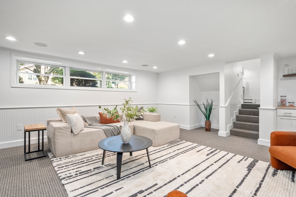 13 Doane Road Medford, MA 02155 - Photo 13 of 42 a living room with furniture and wooden floor