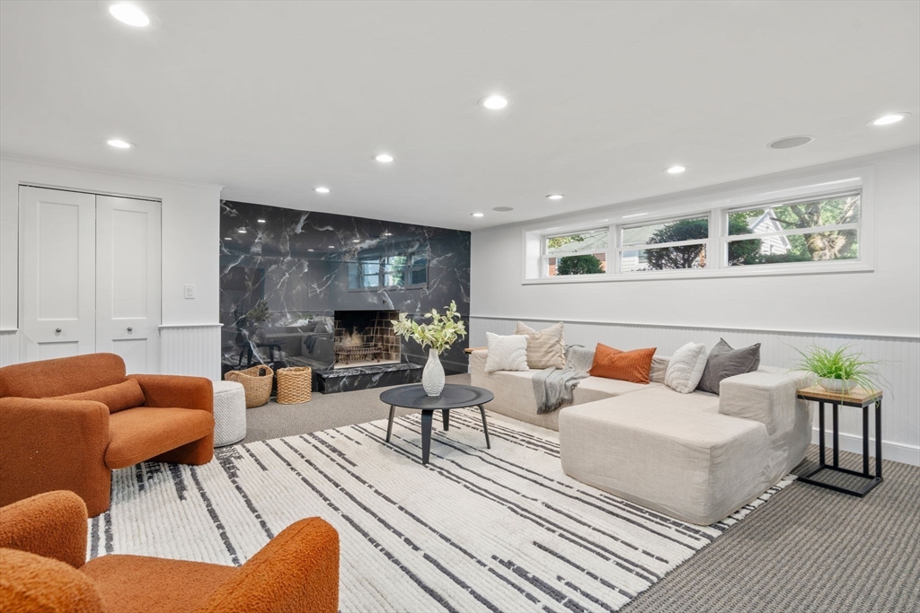 13 Doane Road Medford, MA 02155 - Photo 15 of 42 a living room with furniture and a large window