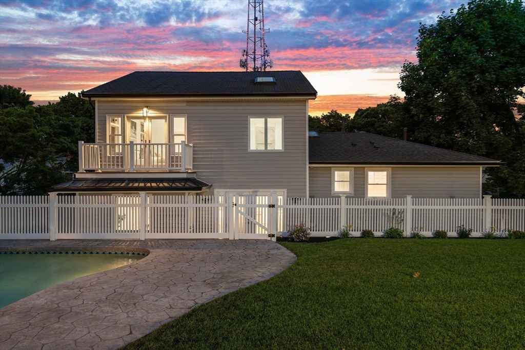 13 Doane Road Medford, MA 02155 - Photo 29 of 42 a front view of a house with a garden