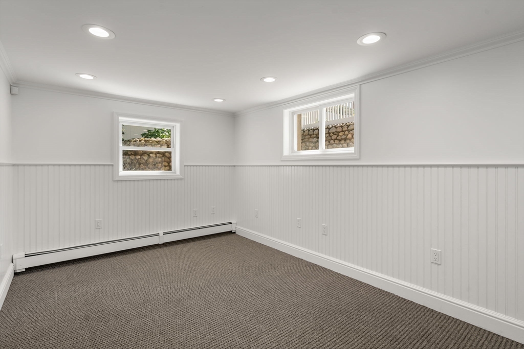 13 Doane Road Medford, MA 02155 - Photo 36 of 42 an empty room with a window