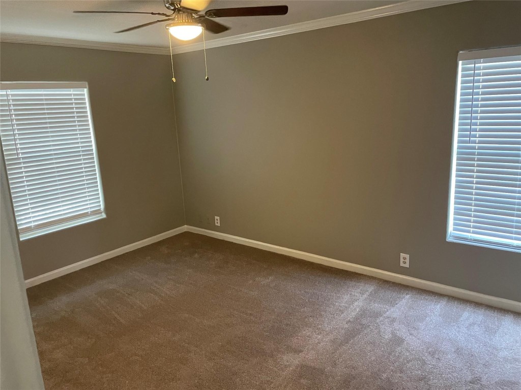 8715 Knox Street, Unit A Houston, TX 77088 - Photo 8 of 11 an empty room with a window