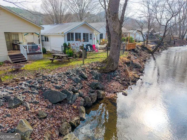 a view of dining room with furniture and window