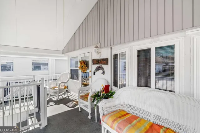 a bathroom with a mirror and a shower