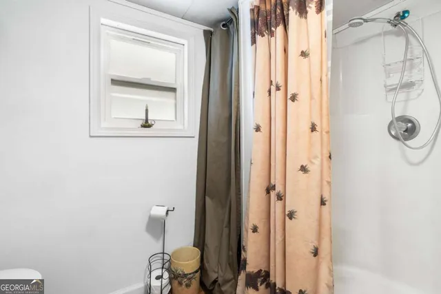 a view of a house with a back yard