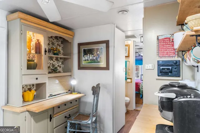 a house with trees in the background