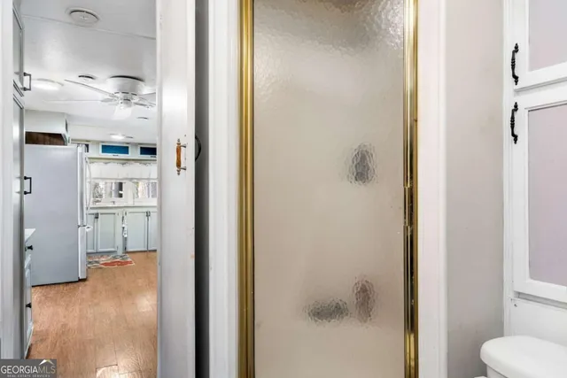 a view of a house with backyard porch and sitting area