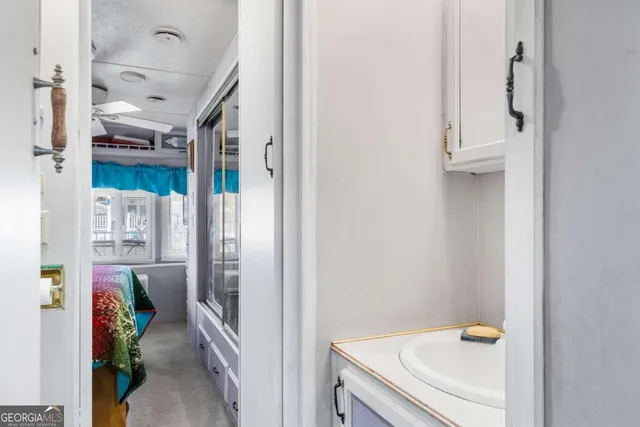 a view of swimming pool with outdoor seating