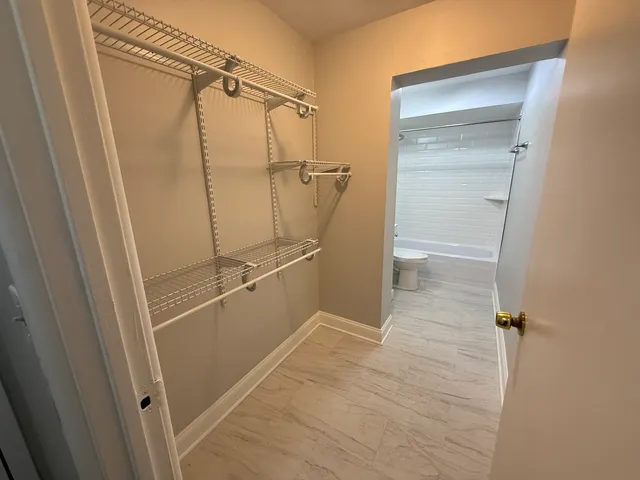 a view of a walk in closet