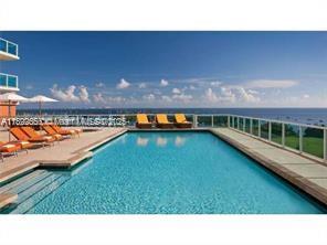 2889 McFarlane Road, Unit 909 Miami, FL 33133 - Photo 11 of 36 a bathroom with a sink