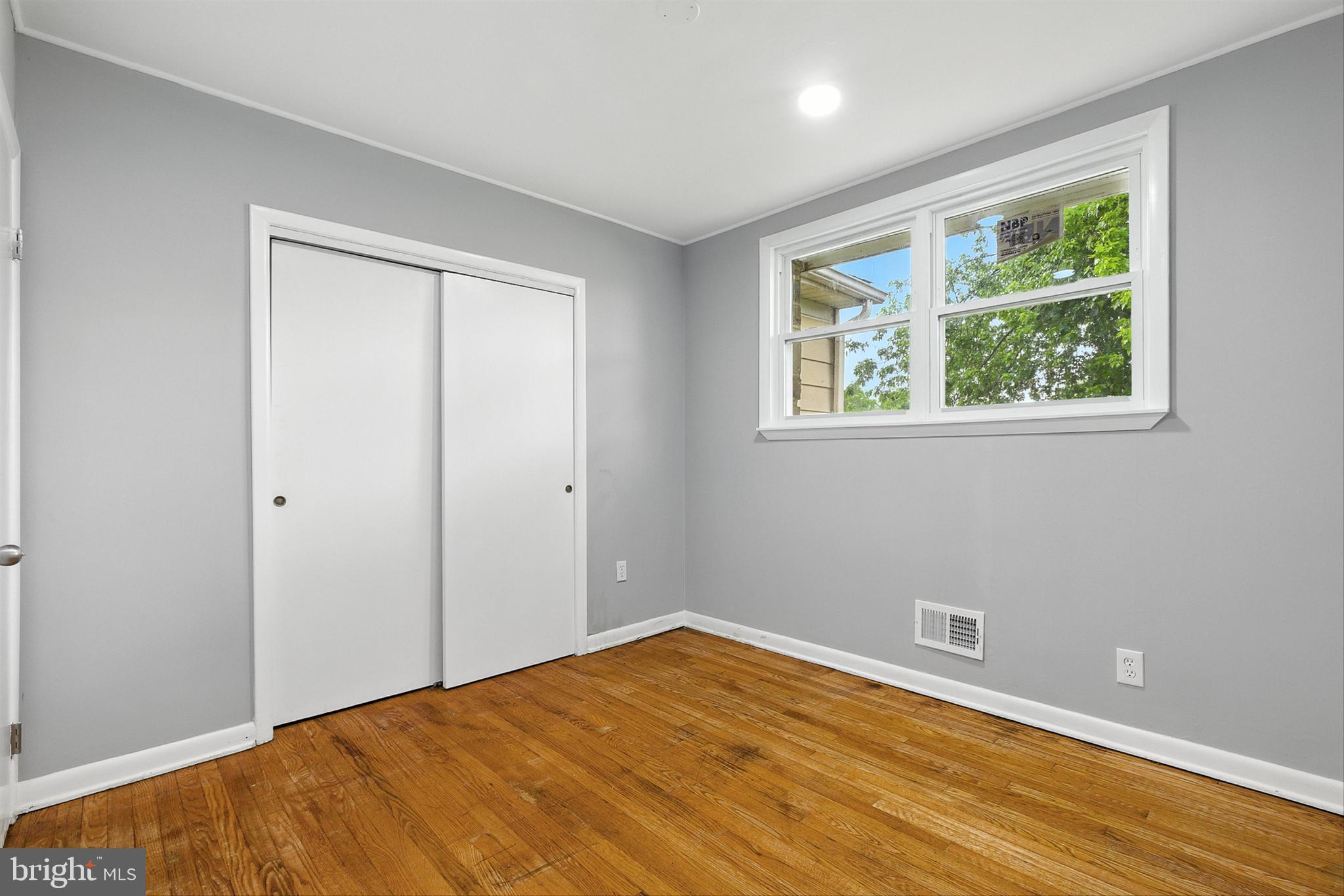 3126 Rices Lane Baltimore, MD 21244 - Photo 16 of 34 a view of empty room with wooden floor and fan