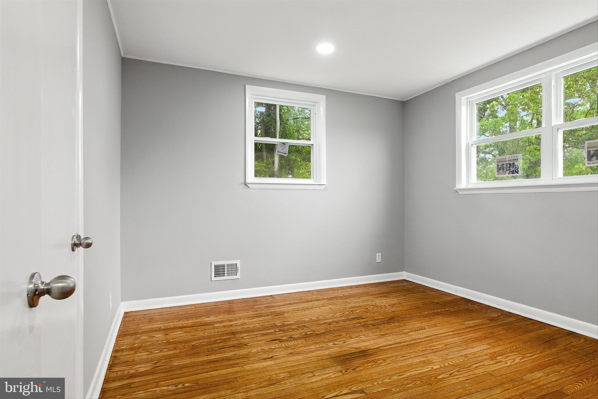 3126 Rices Lane Baltimore, MD 21244 - Photo 18 of 34 a view of a room with wooden floor and natural light