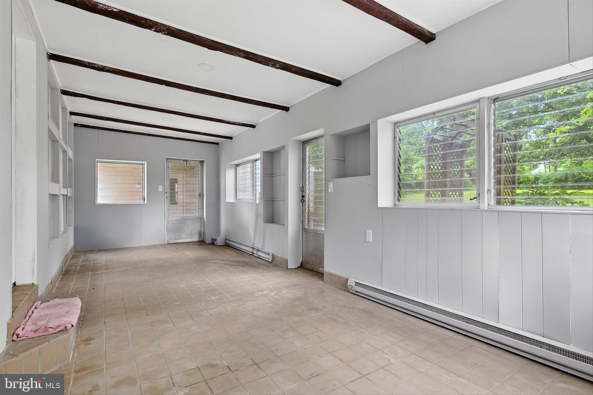 3126 Rices Lane Baltimore, MD 21244 - Photo 28 of 34 a view of an empty room with a window