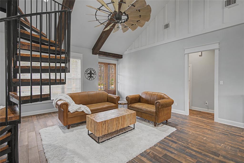 550 Ramsey Road Stonewall, LA 71078 - Photo 6 of 40 a living room with furniture and a rug