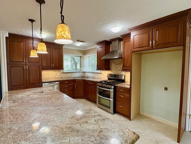 17706 Woodlode Lane Spring, TX 77379 - Photo 12 of 31 a open kitchen with stainless steel appliances granite countertop a stove a refrigerator and a sink with granite countertops