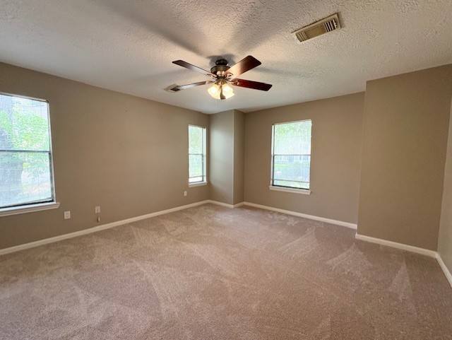 17706 Woodlode Lane Spring, TX 77379 - Photo 17 of 31 a view of an empty room with a window