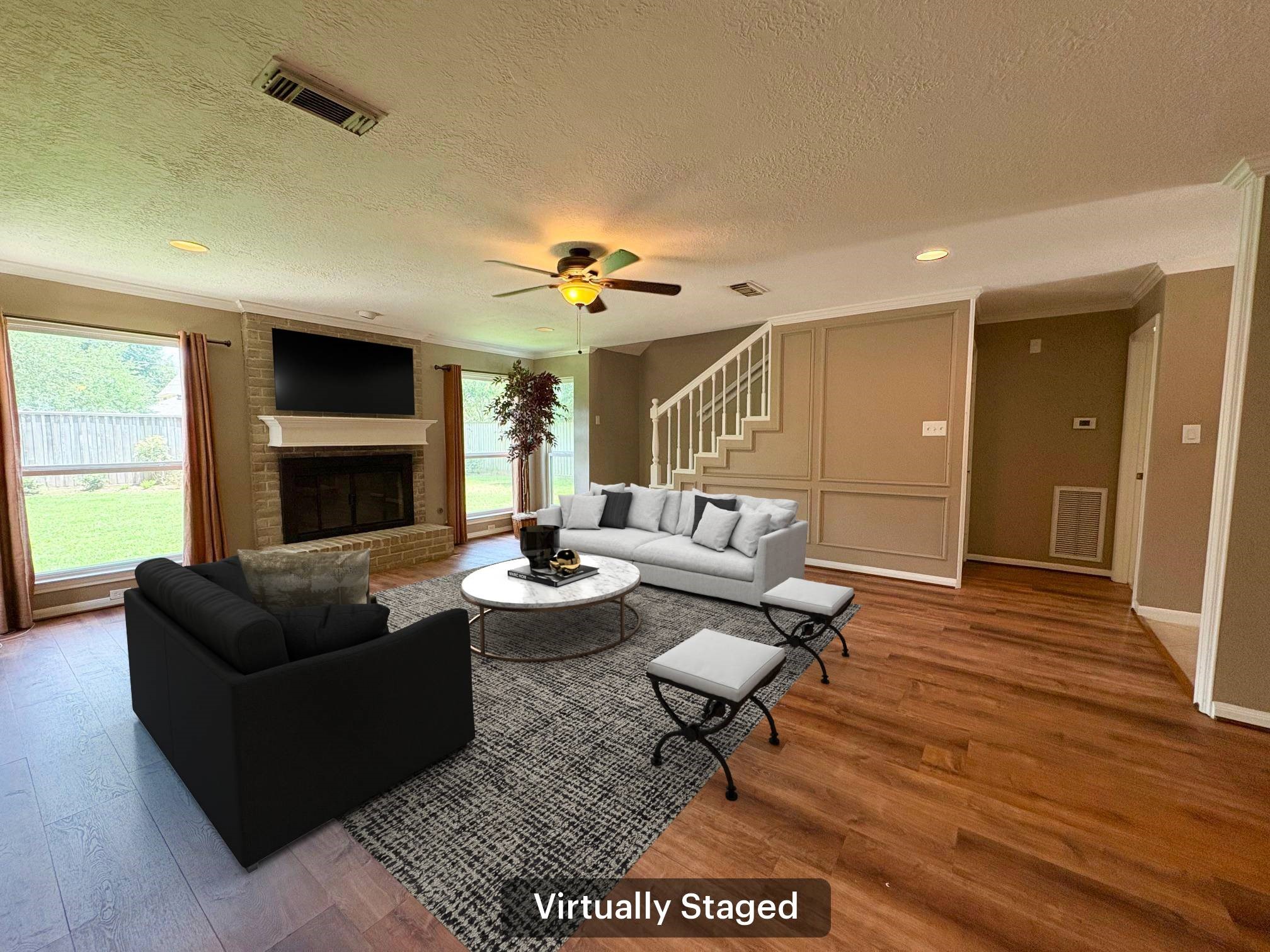 17706 Woodlode Lane Spring, TX 77379 - Photo 4 of 31 a living room with furniture and a fireplace