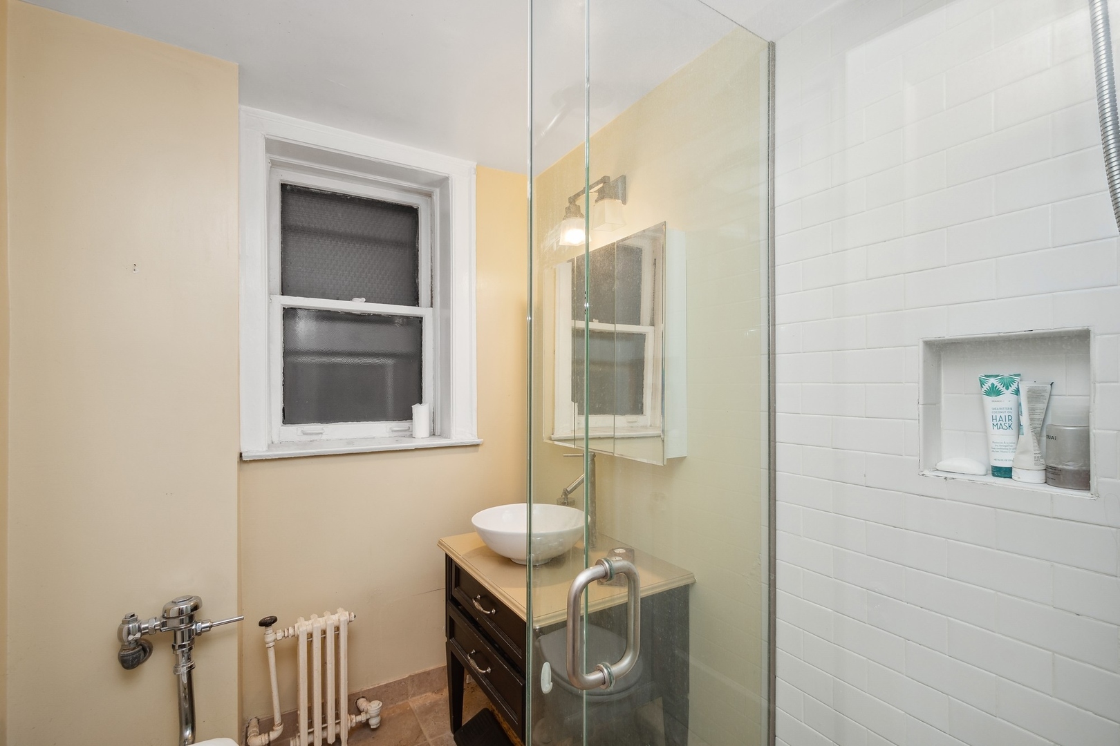 400 West Deming Place, Unit 2K Chicago, IL 60614 - Photo 10 of 10 a bathroom with a sink toilet and mirror