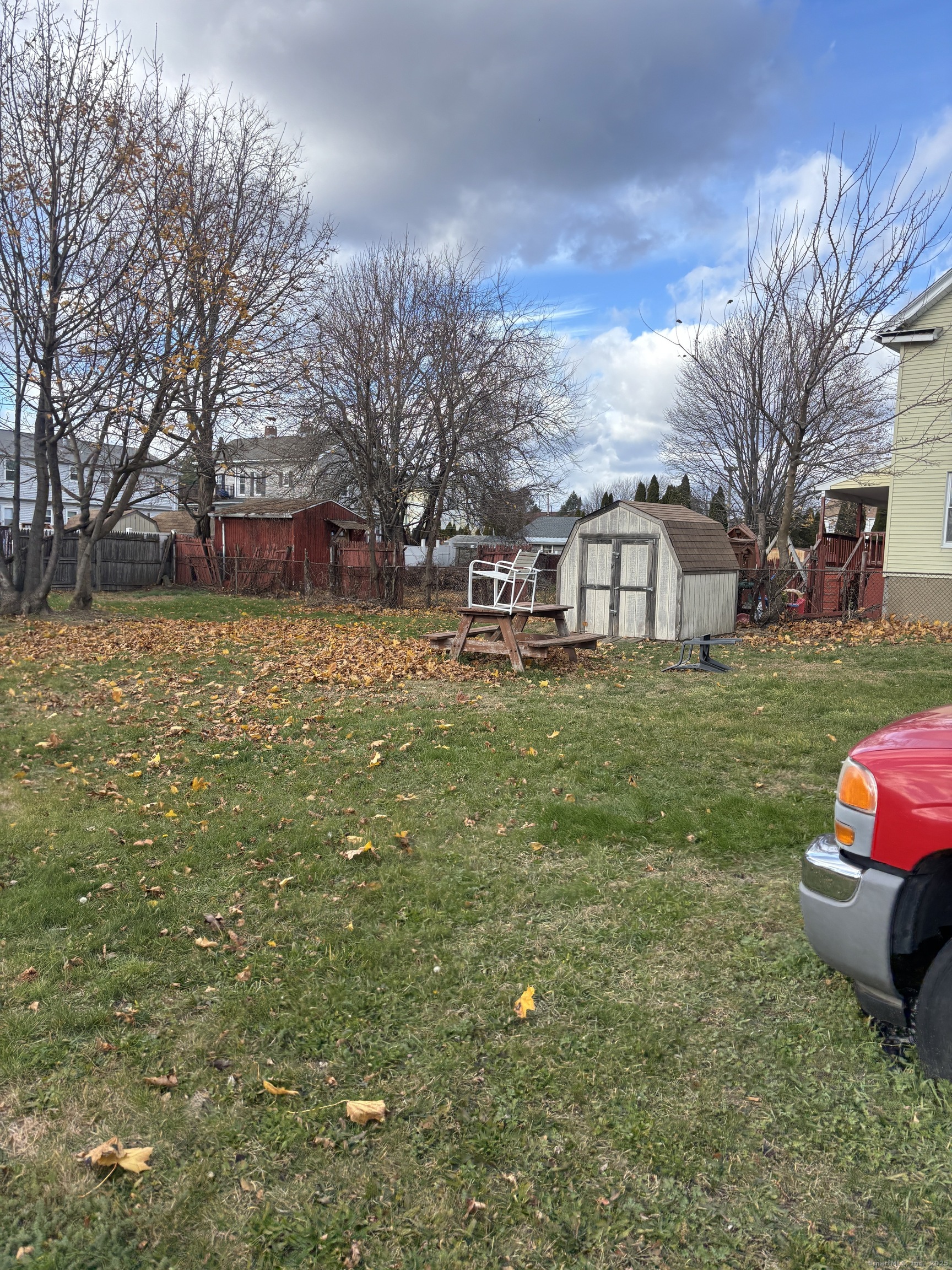 509 Pembroke Street Bridgeport, CT 06608 - Photo 20 of 25 a view of a house with a yard