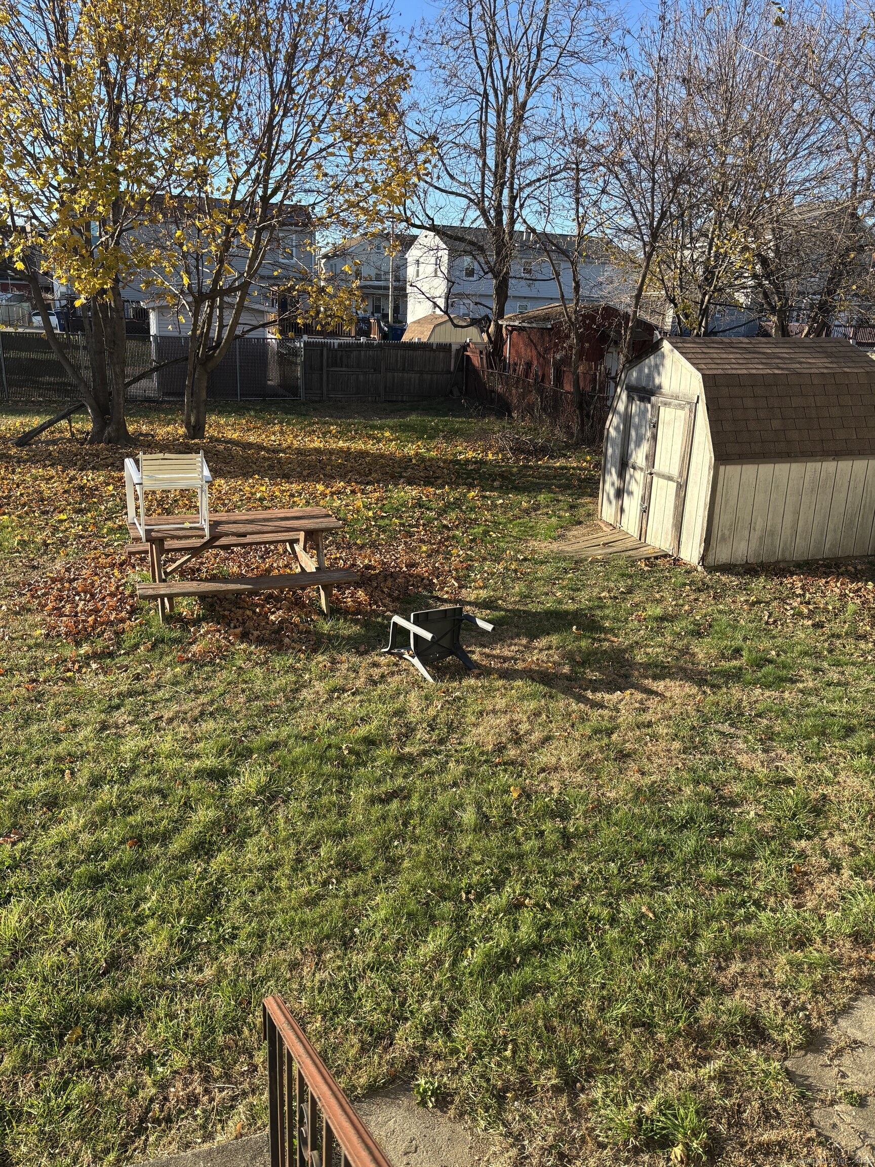 509 Pembroke Street Bridgeport, CT 06608 - Photo 24 of 25 a backyard of a house with lots of green space