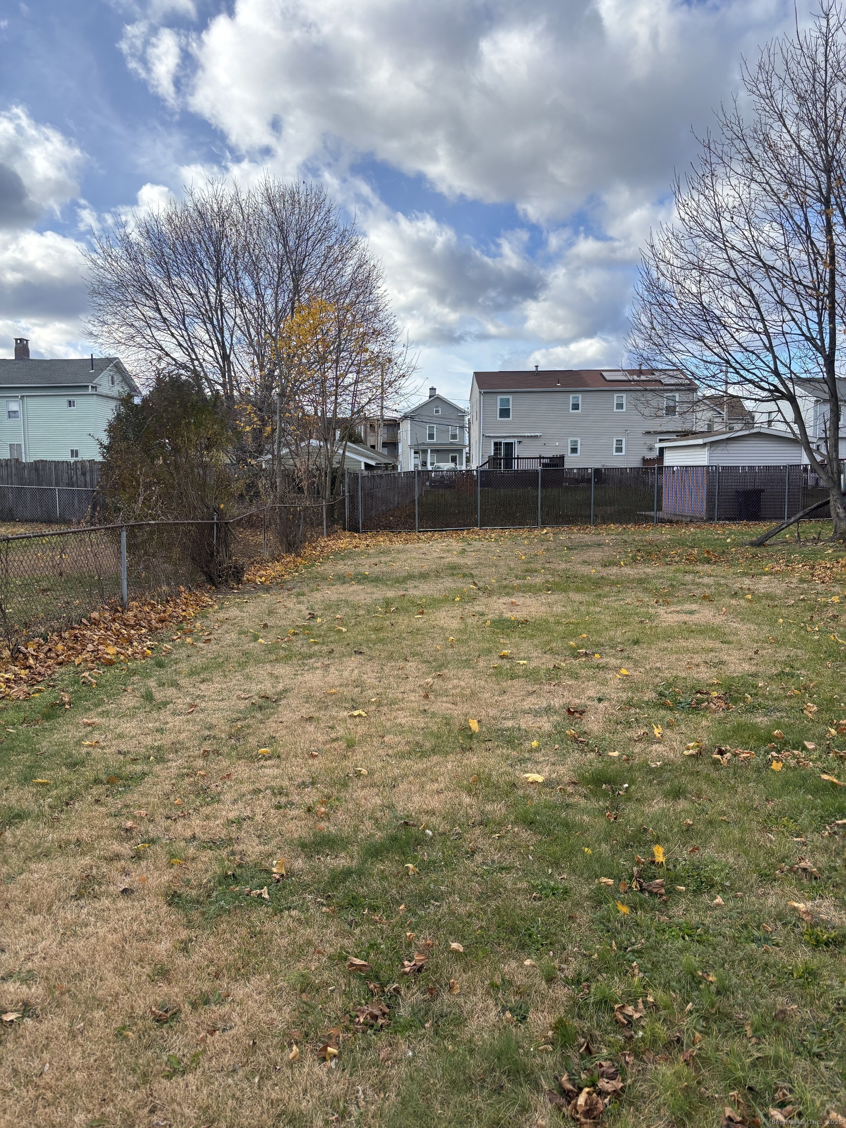 509 Pembroke Street Bridgeport, CT 06608 - Photo 6 of 25 a view of a yard with a building
