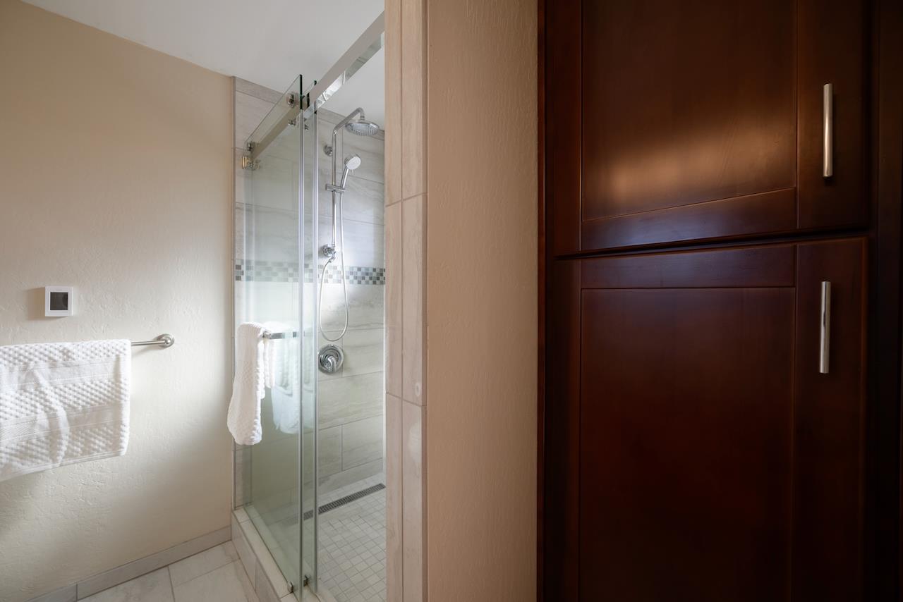 155 Rabbits Run Road Santa Cruz, CA 95060 - Photo 57 of 113 a bathroom with a glass shower door