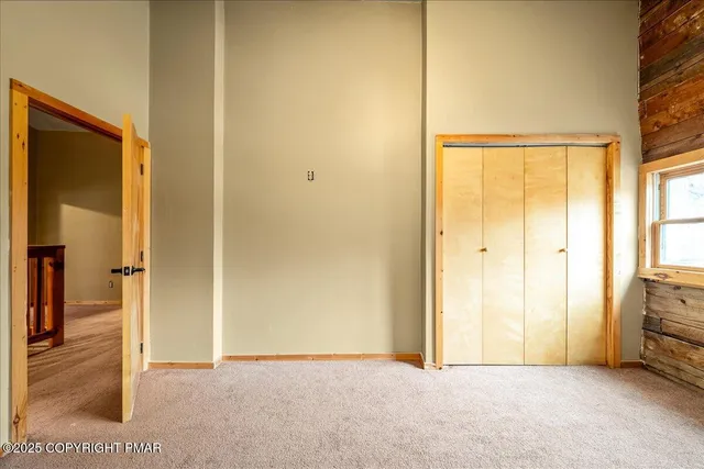 a view of a room with closet area