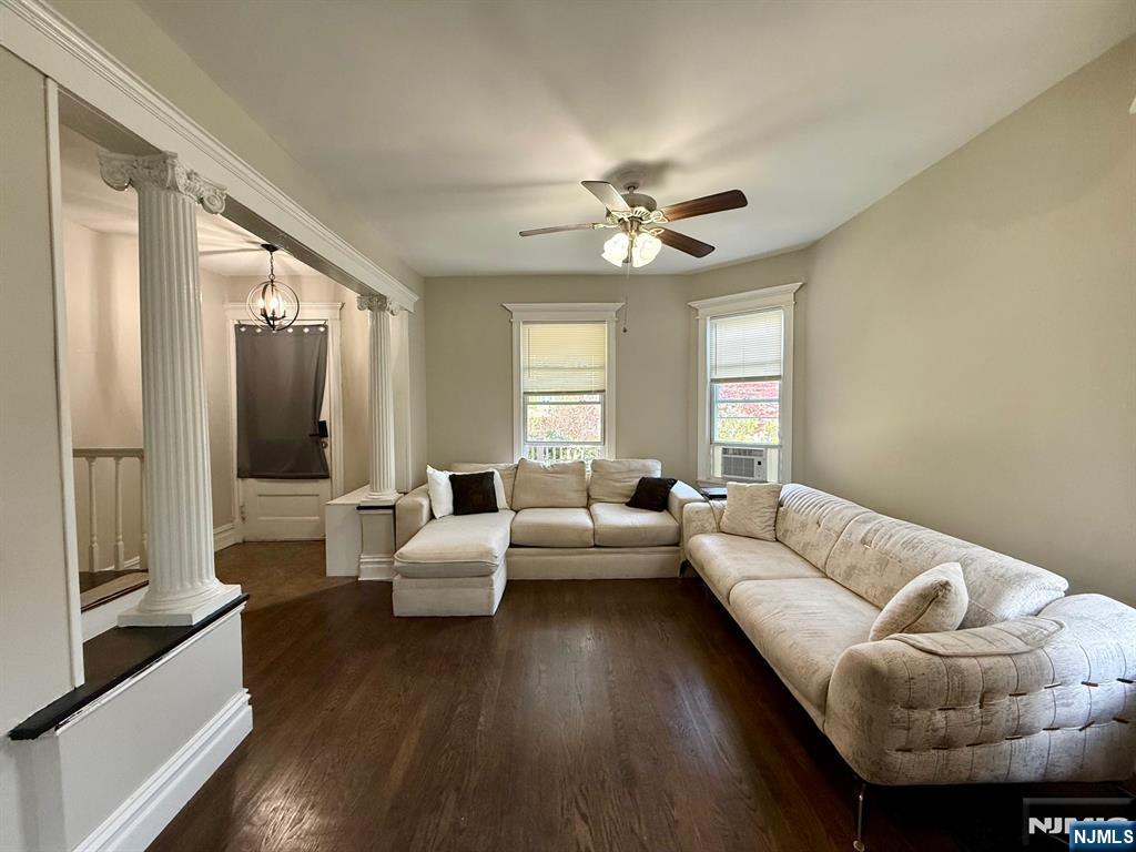 162 Sylvan Street Rutherford, NJ 07070 - Photo 3 of 40 a living room with furniture and a large window