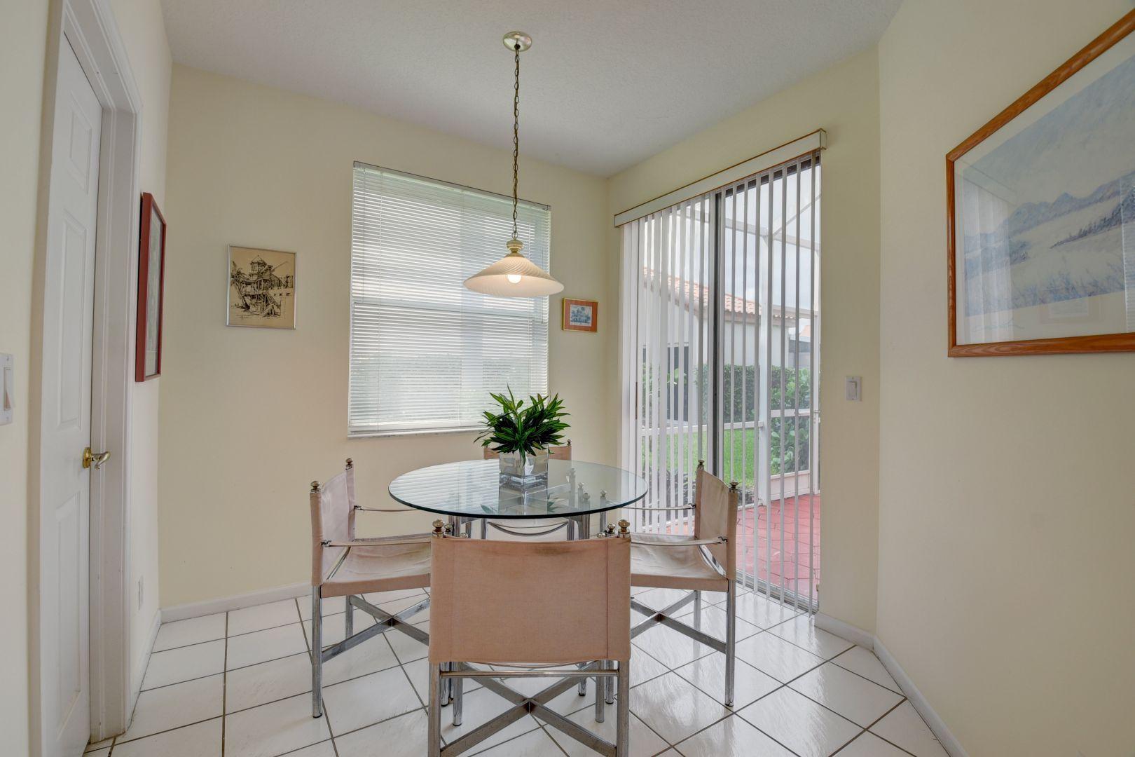 23349 Water Circle Boca Raton, FL 33486 - Photo 14 of 44 Breakfast Area open to patio