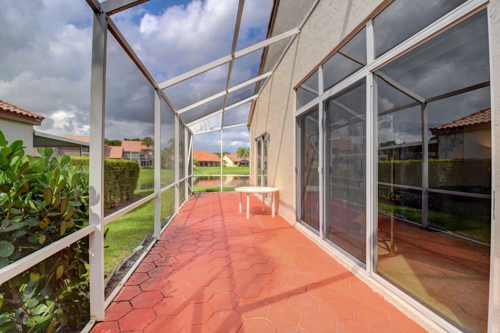 23349 Water Circle Boca Raton, FL 33486 - Photo 9 of 44 Huge Screened Porch