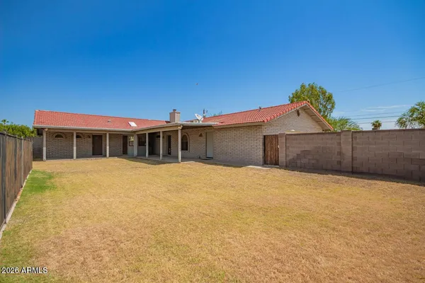 a view of a swimming pool with an ocean view