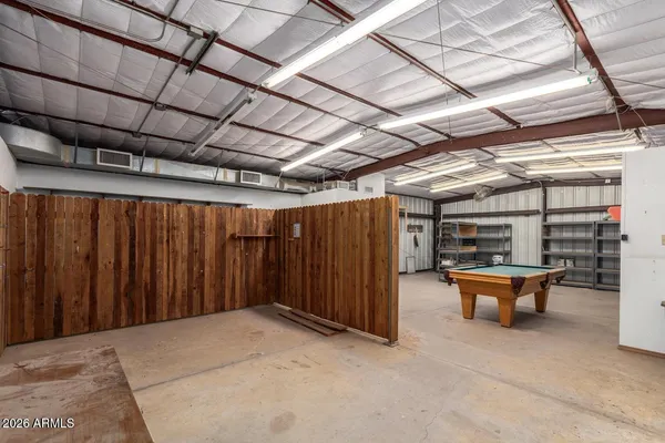 a view of room with clothes and shoes