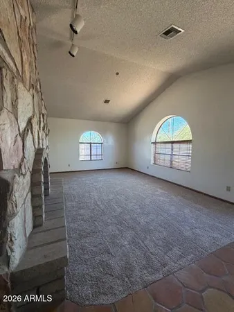 an empty room with windows