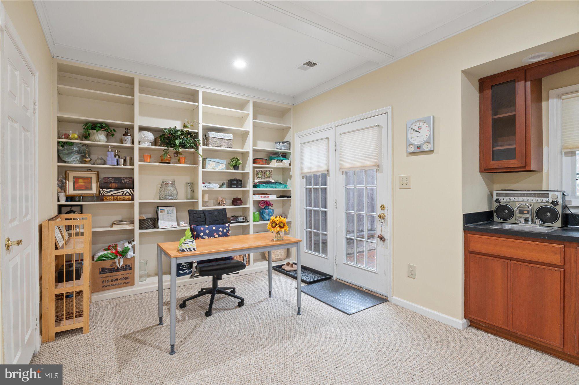 8001 Quarry Ridge Way Bethesda, MD 20817 - Photo 44 of 55 Daylight Rec Rm withExit to Brick Patio