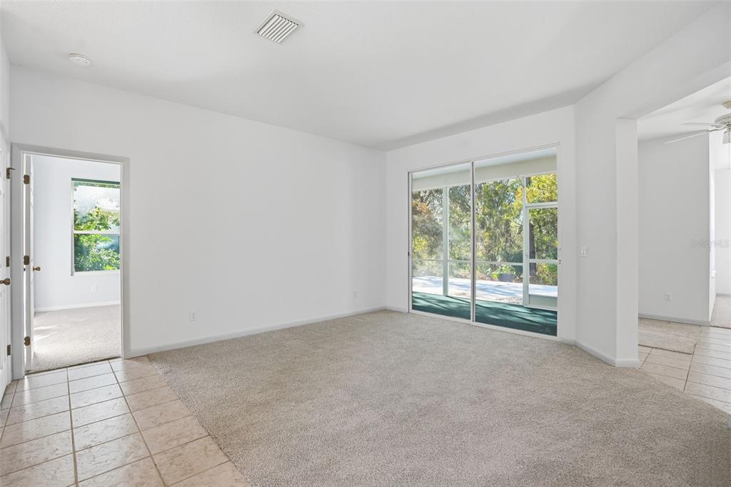 16 Nephthytis Court Homosassa, FL 34446 - Photo 12 of 45 a view of an empty room with a window