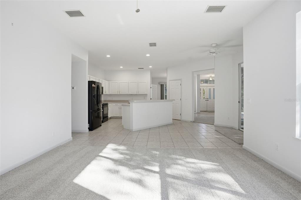 16 Nephthytis Court Homosassa, FL 34446 - Photo 13 of 45 a view of a kitchen with refrigerator and a sink